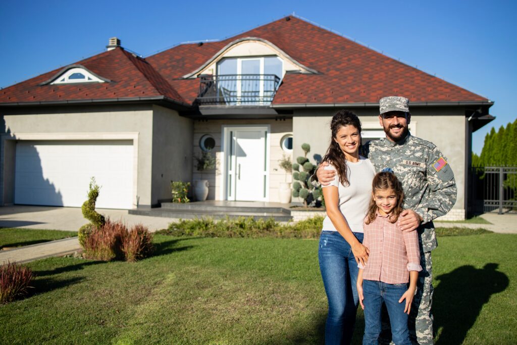 Portrait of happy American military family welcoming father soldier coming home.