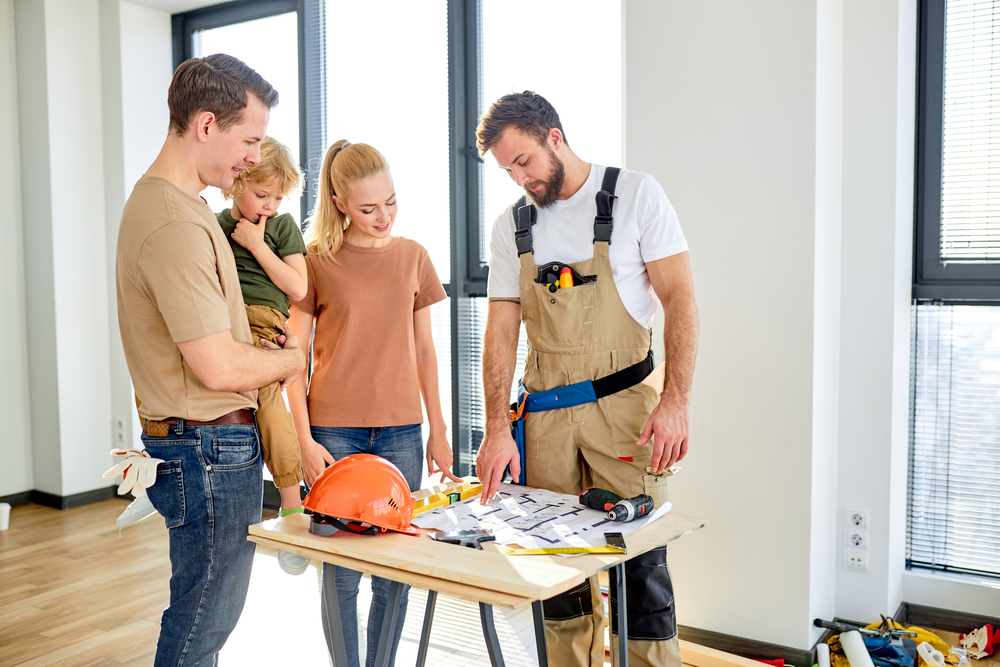 family talking to contractor about home renovation